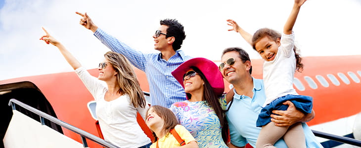 A family prepares to board an airplane