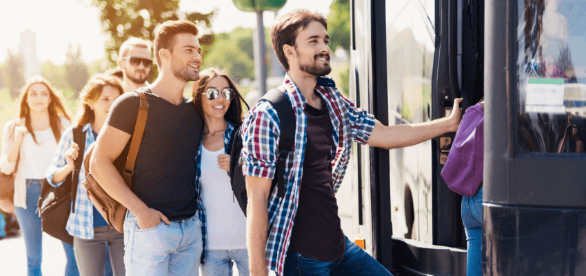 friends board a charter bus