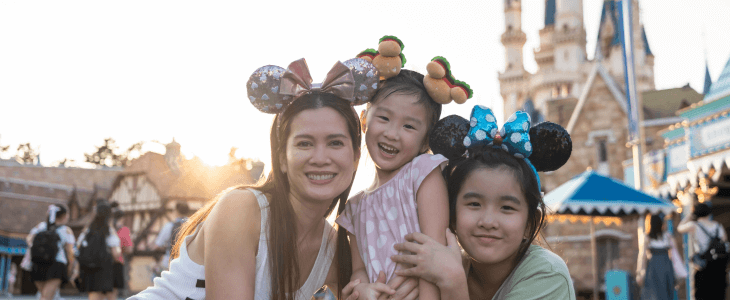 a family at the disney castle